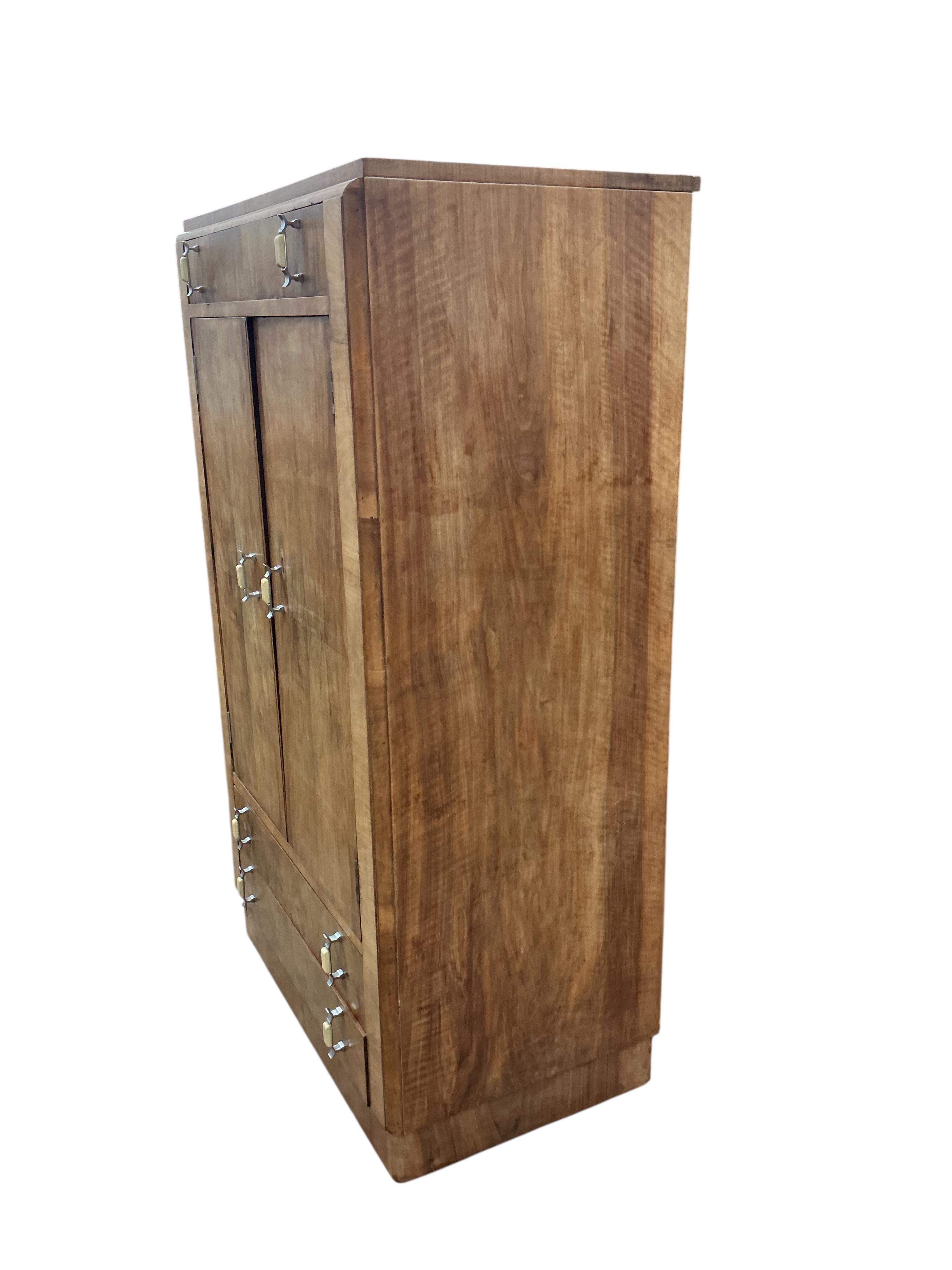 An Art Deco walnut gentleman's wardrobe, width 83cm, depth 49cm, height 140cm